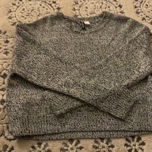 woman’s cropped sweater